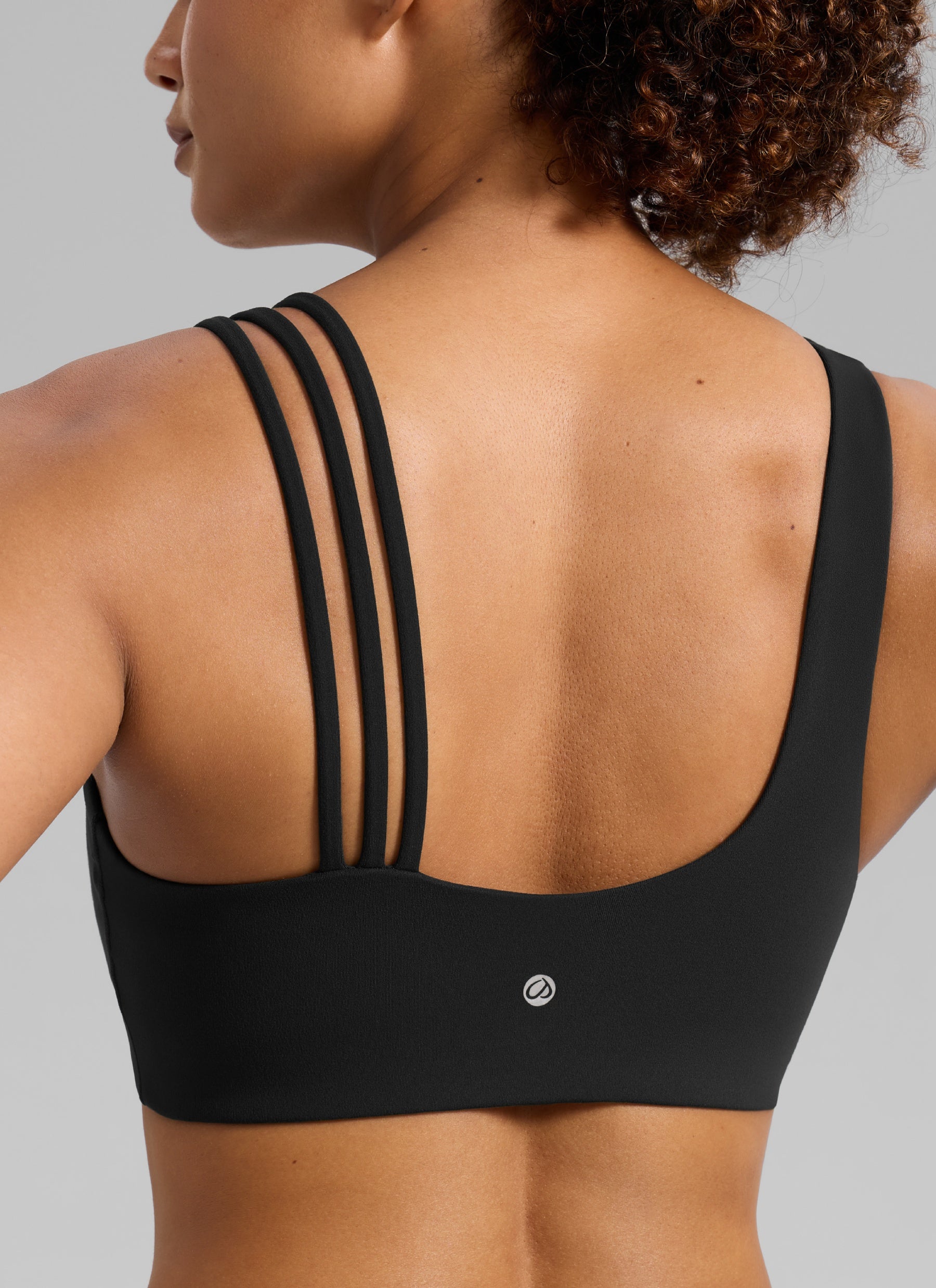 CRZ YOGA Damen Butterlift Sport-BH mit Asymmetrischen Trägern Schwarz @model_info:Barbara
