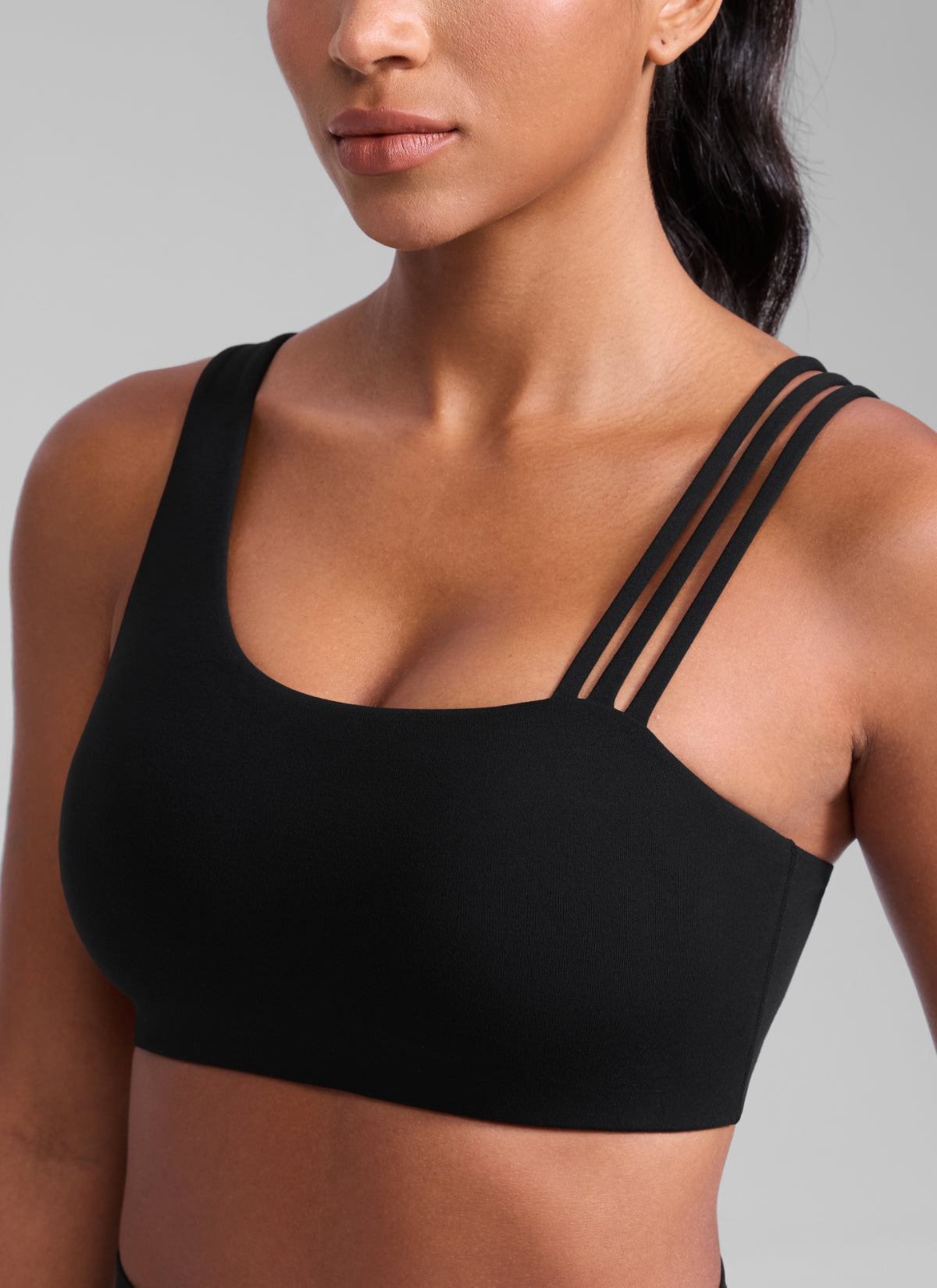CRZ YOGA Damen Butterlift Sport-BH mit Asymmetrischen Trägern Schwarz