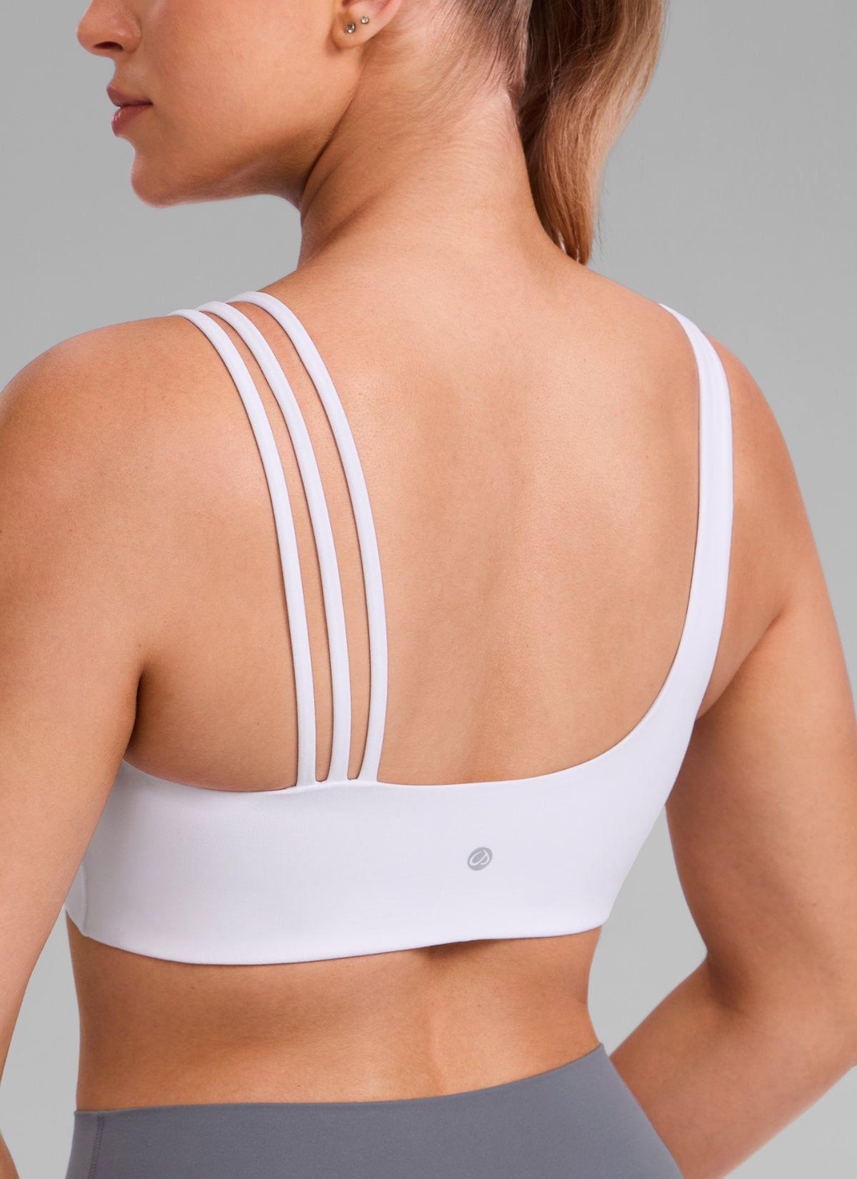 CRZ YOGA Damen Butterlift Sport-BH mit Asymmetrischen Trägern Weiss