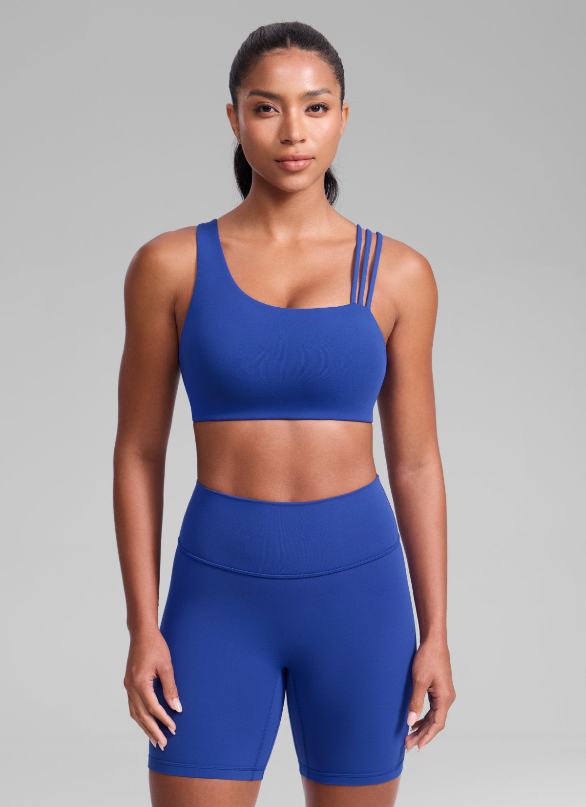CRZ YOGA Damen Butterlift Sport-BH mit Asymmetrischen Trägern Wellen Blau