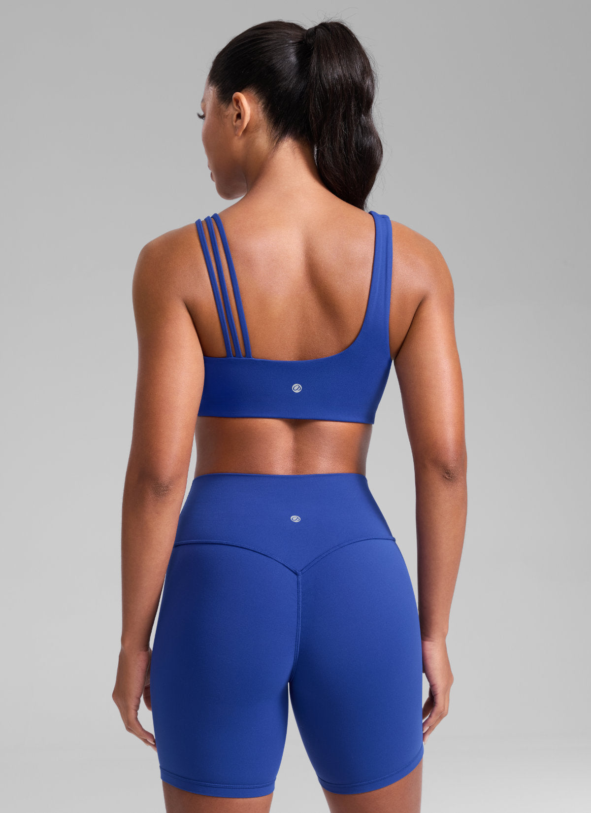 CRZ YOGA Damen Butterlift Sport-BH mit Asymmetrischen Trägern Wellen Blau