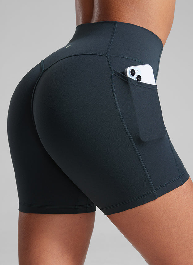 CRZ YOGA Damen Secretsculpt Butterlift Biker mit Taschen - 13cm Echte Marine