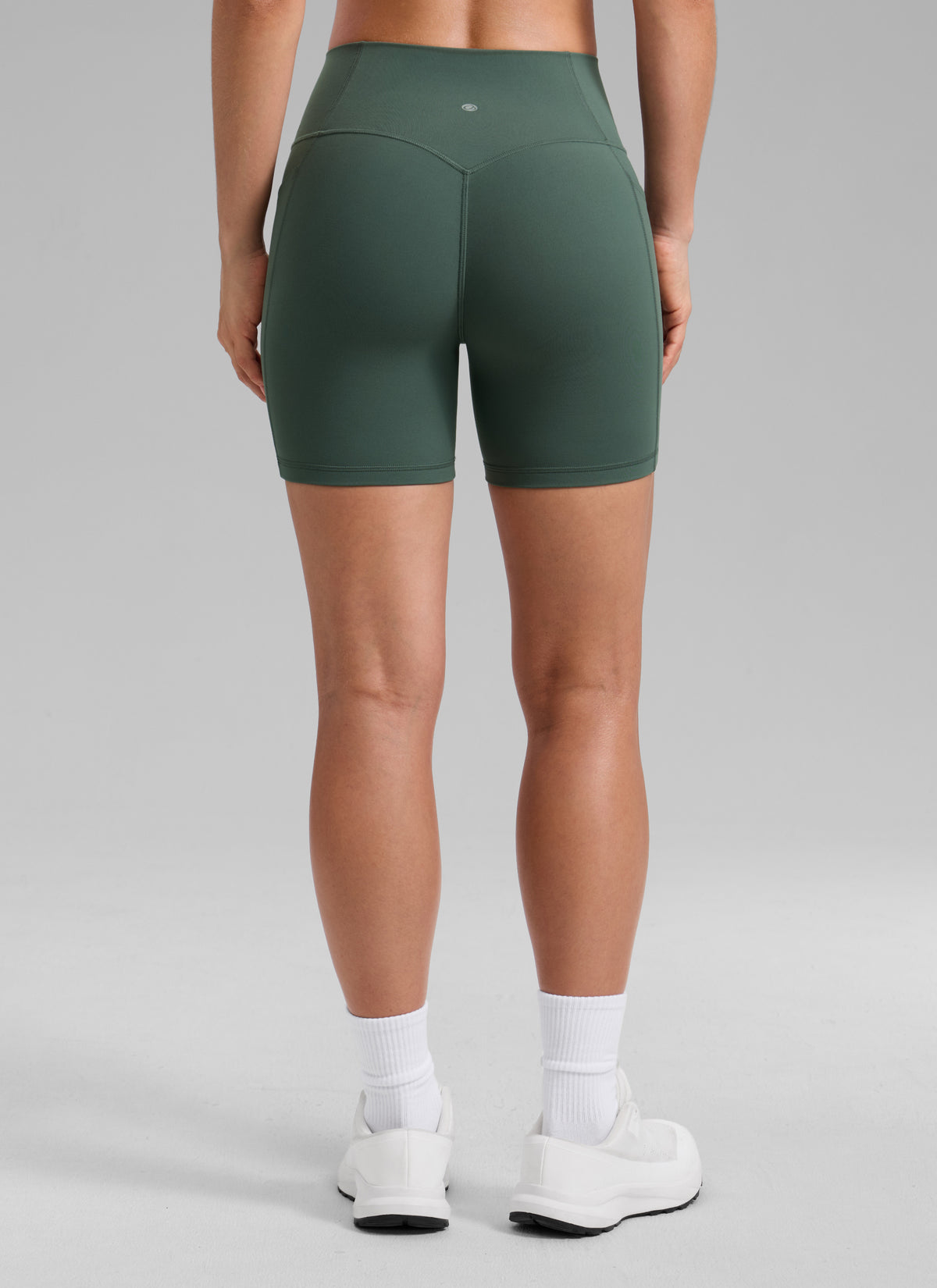 CRZ YOGA Damen Secretsculpt Butterlift Biker mit Taschen - 13cm Dunkles Waldgrün @model_info:A
