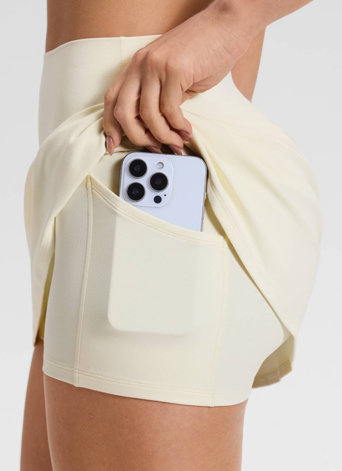 CRZ YOGA Damen Butterluxe Hohe Taille A-Line Tennis Röcke mit Taschen Gloam Yellow Light