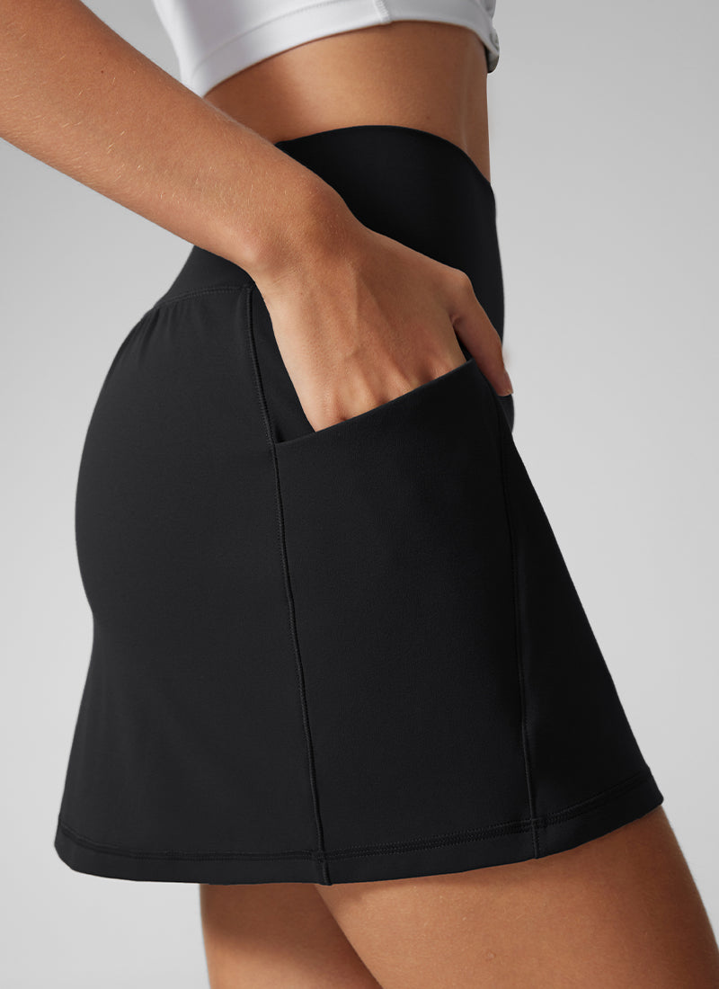 CRZ YOGA Damen Butterlift Hohe Taille A-Linien-Röcke mit Seitentaschen Schwarz