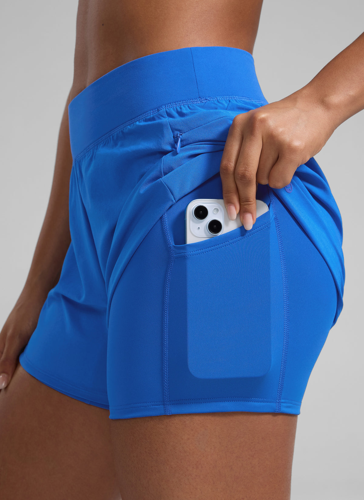 CRZ YOGA Damen 2 in 1 Laufshorts mit Reißverschlusstaschen - 8 cm Funkelndes Blau