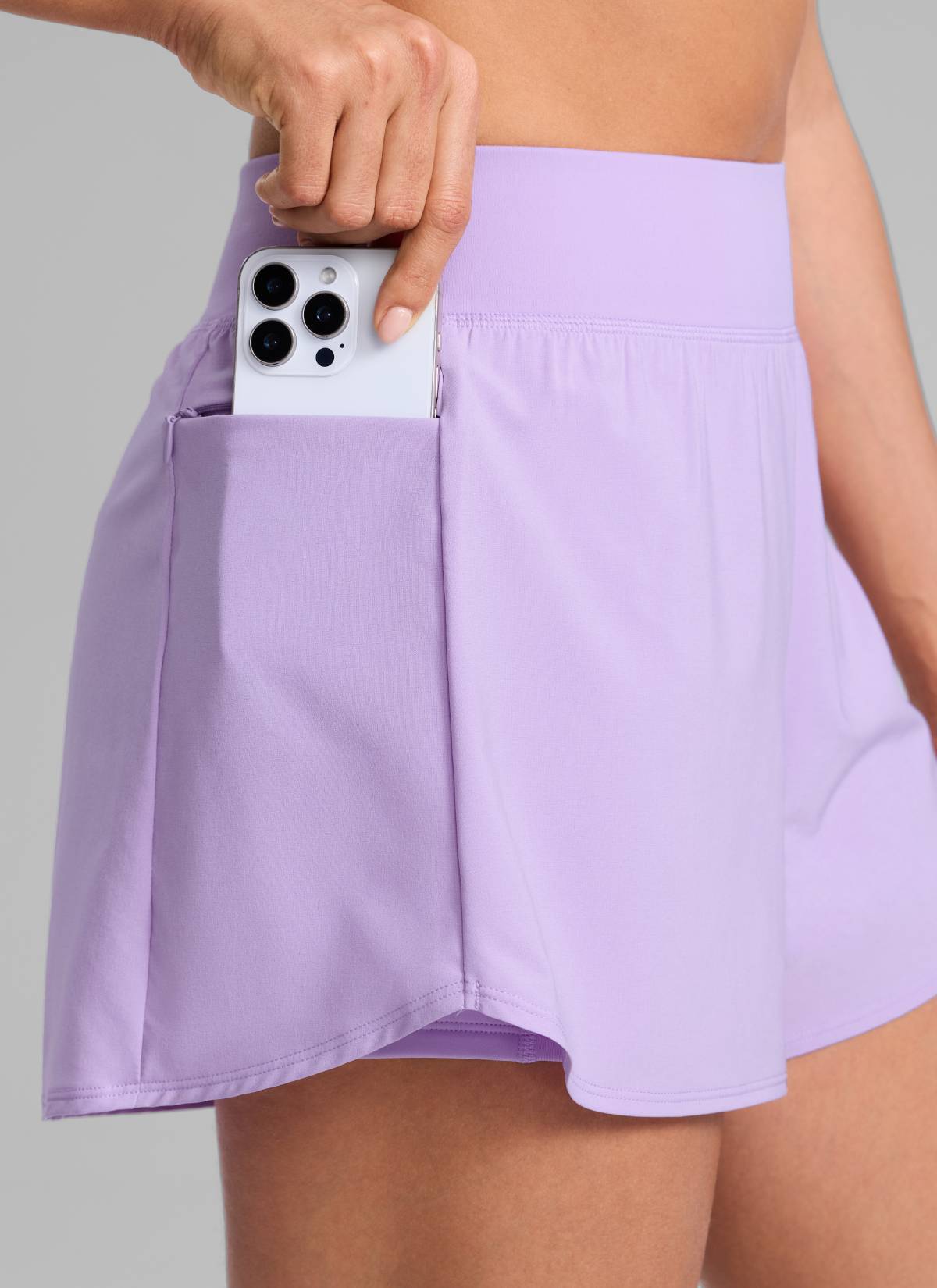 CRZ YOGA Damen 2 in 1 Laufshorts mit Reißverschlusstaschen - 8 cm Flieder
