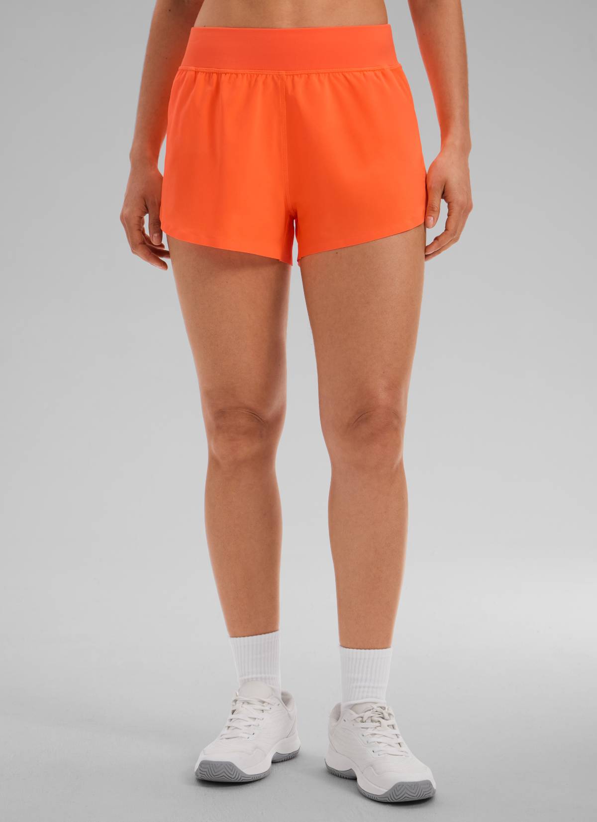 CRZ YOGA Damen Splits Sport Shorts mit Reißverschlusstasche - 8cm Neon Orange