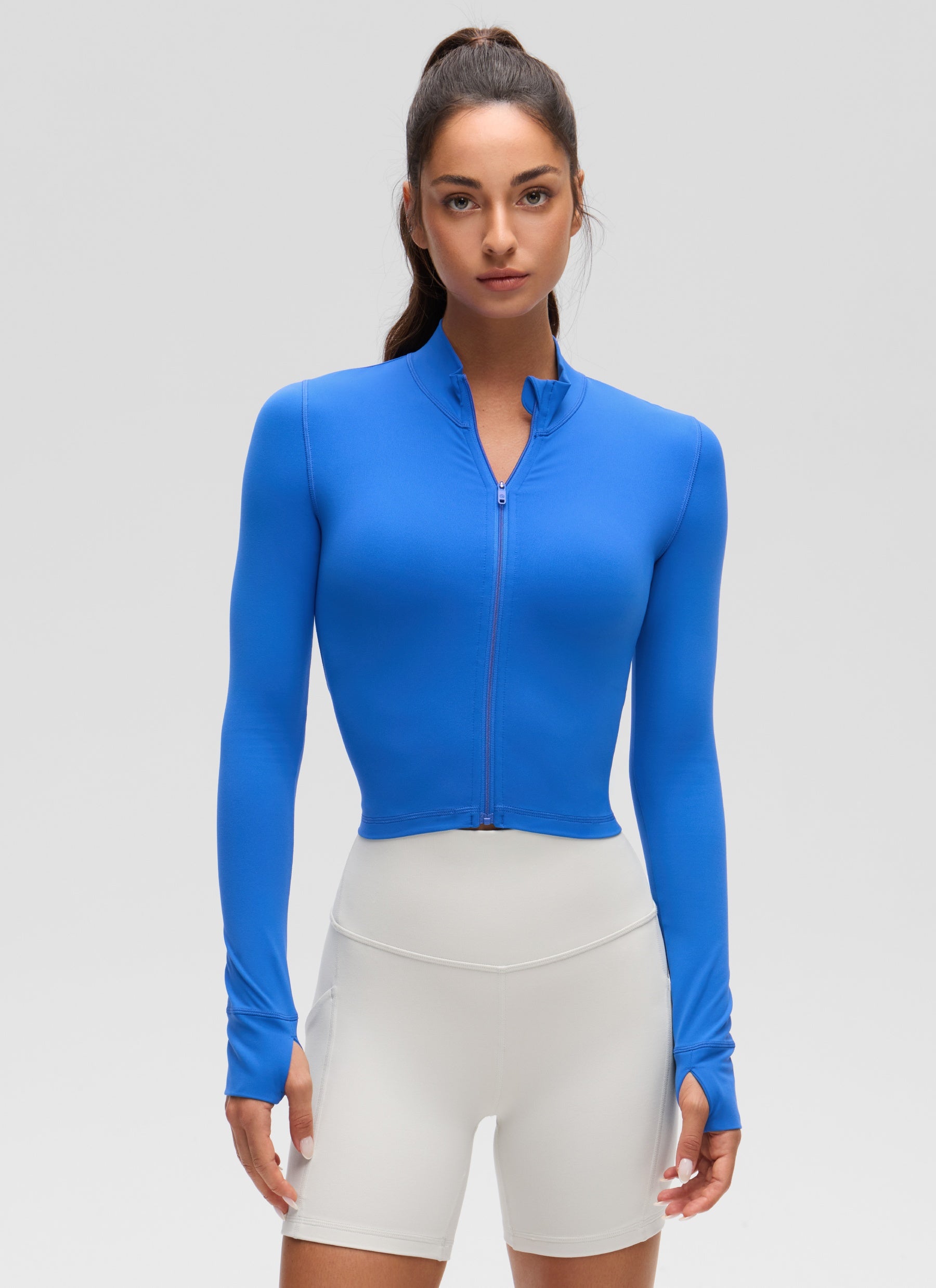 CRZ YOGA Damen Butterluxe Reißverschluss Cropped Jacke mit Daumenloch Funkelndes Blau